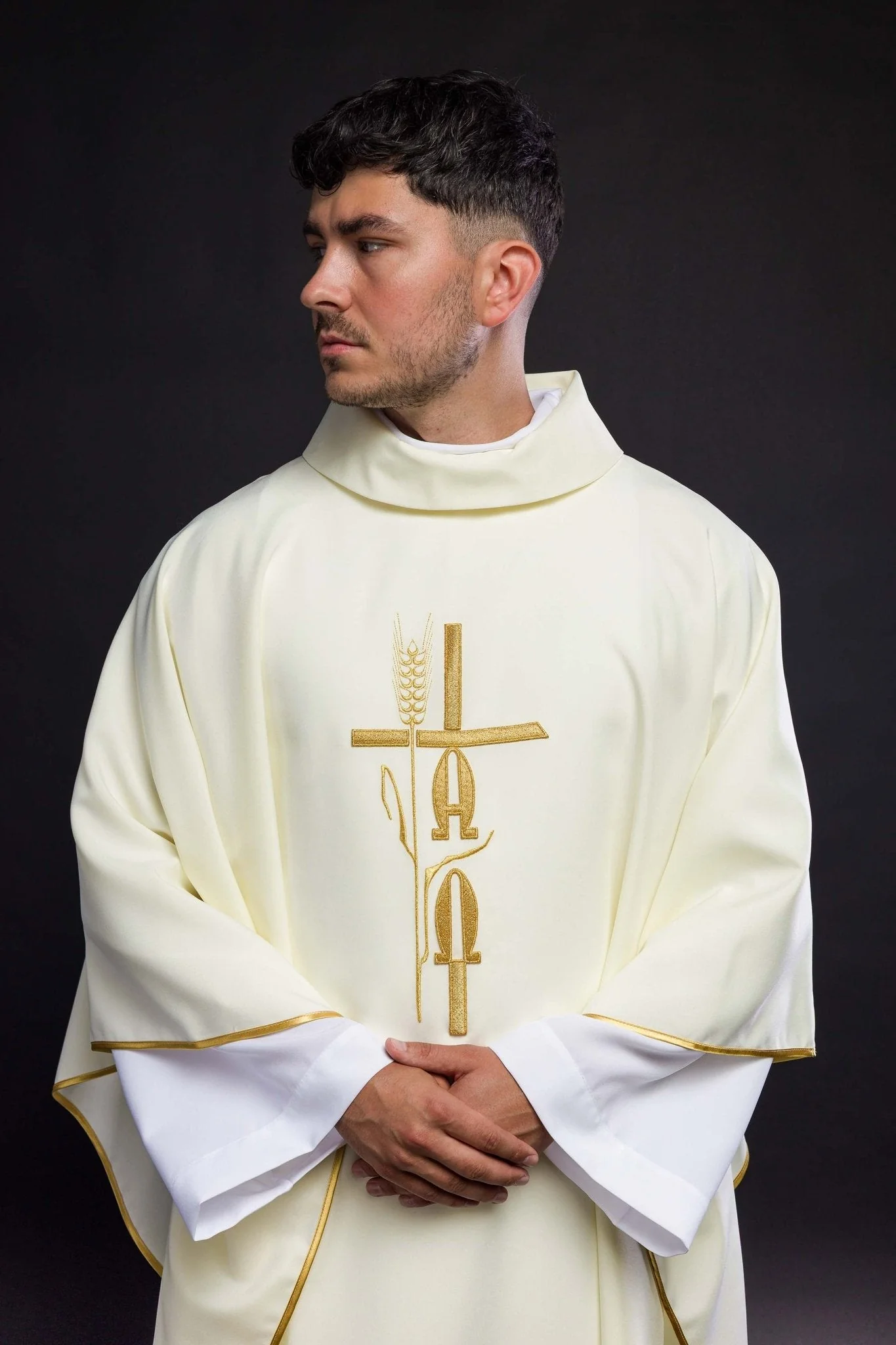 Ecru chasuble with cross and alfa omega symbols