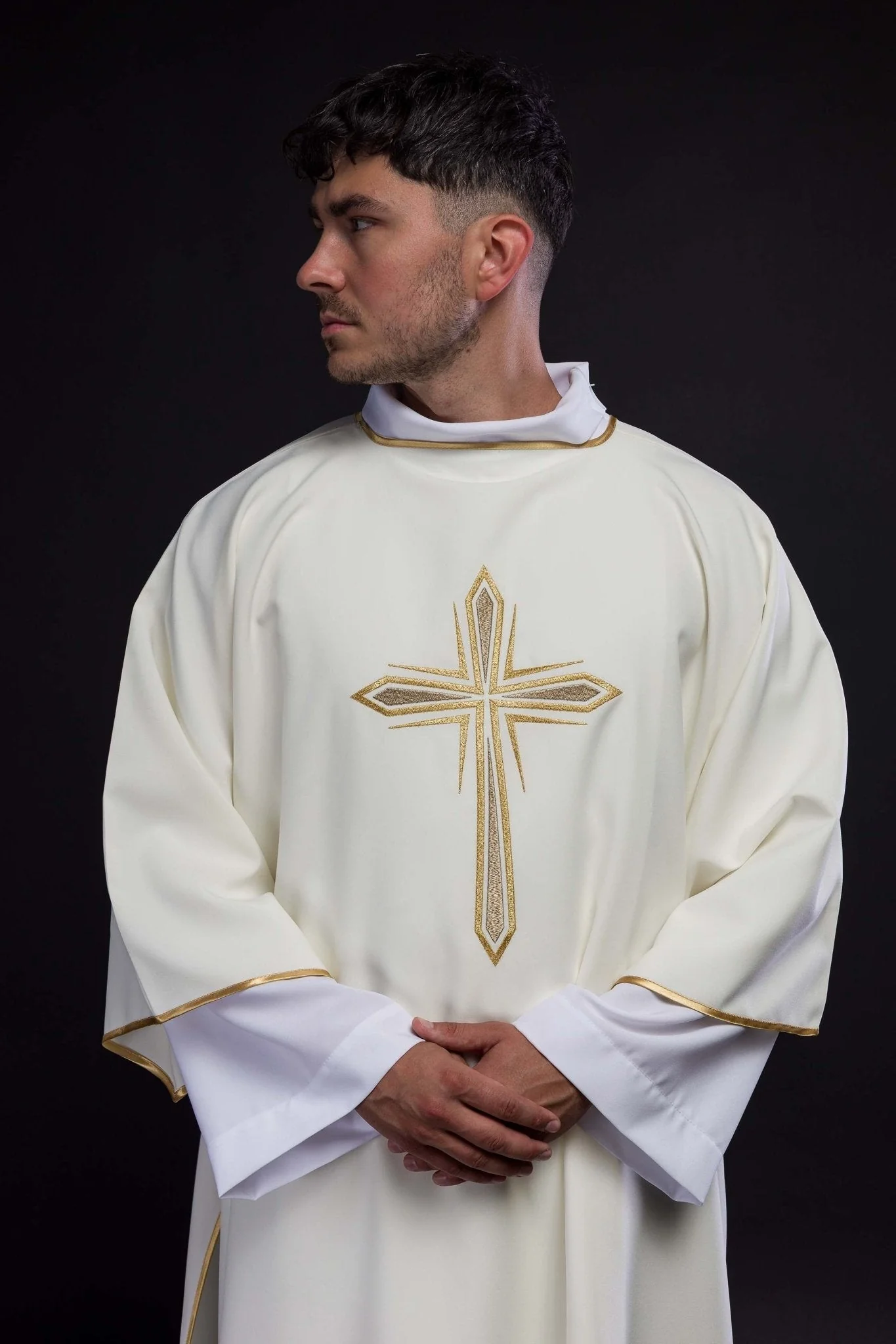 Ecru dalmatic with embroidered golden cross