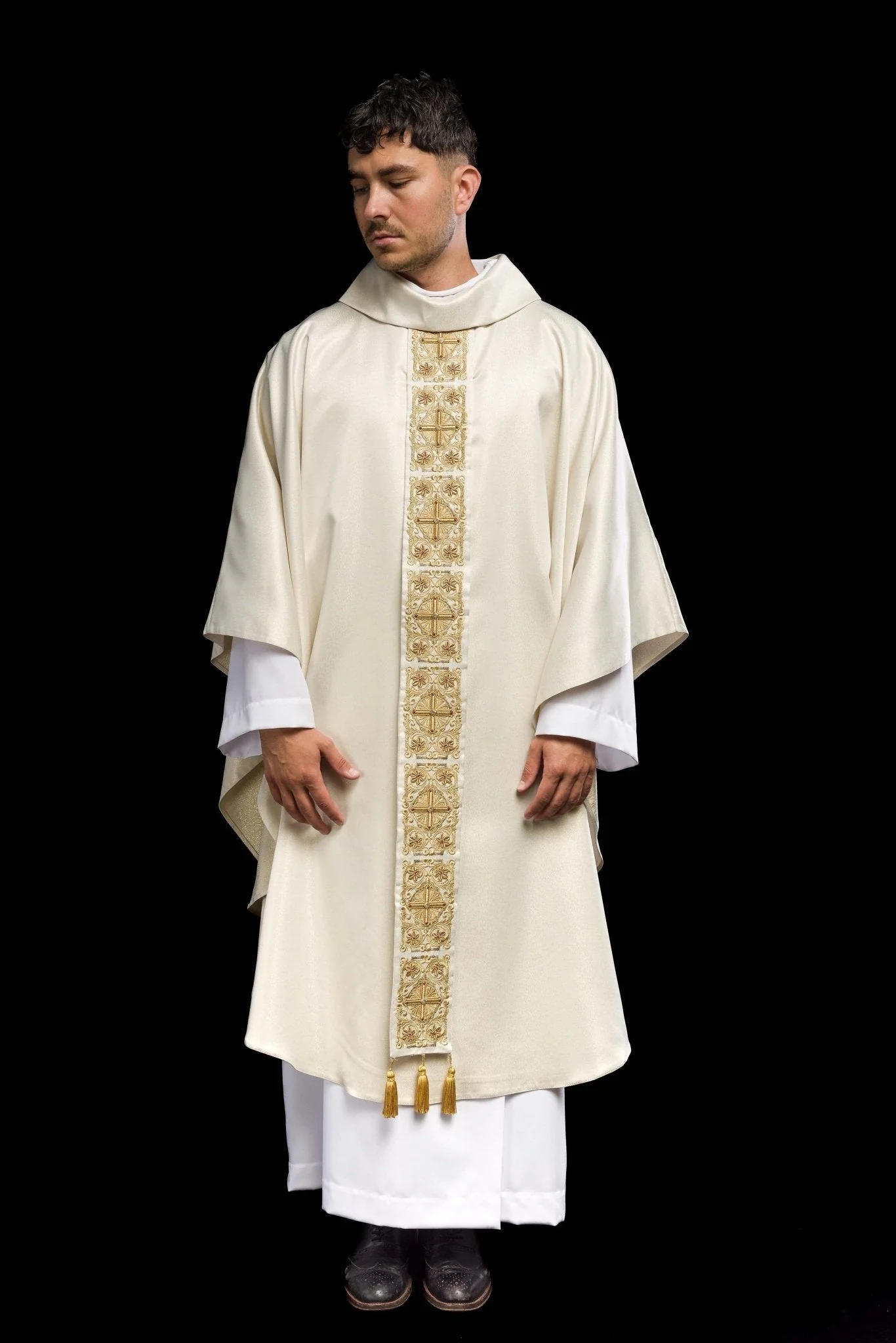 Gold Chasuble richly embroidered and decorated with gold stones