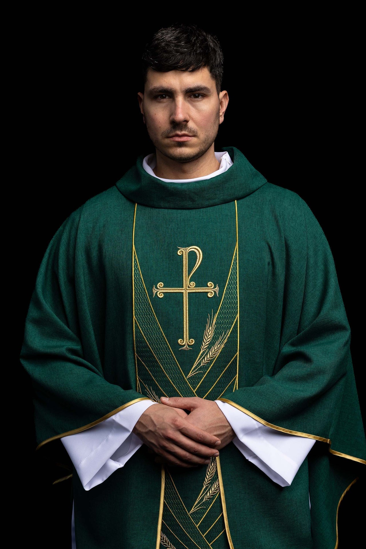 Green chasuble with an embroidered Pax band