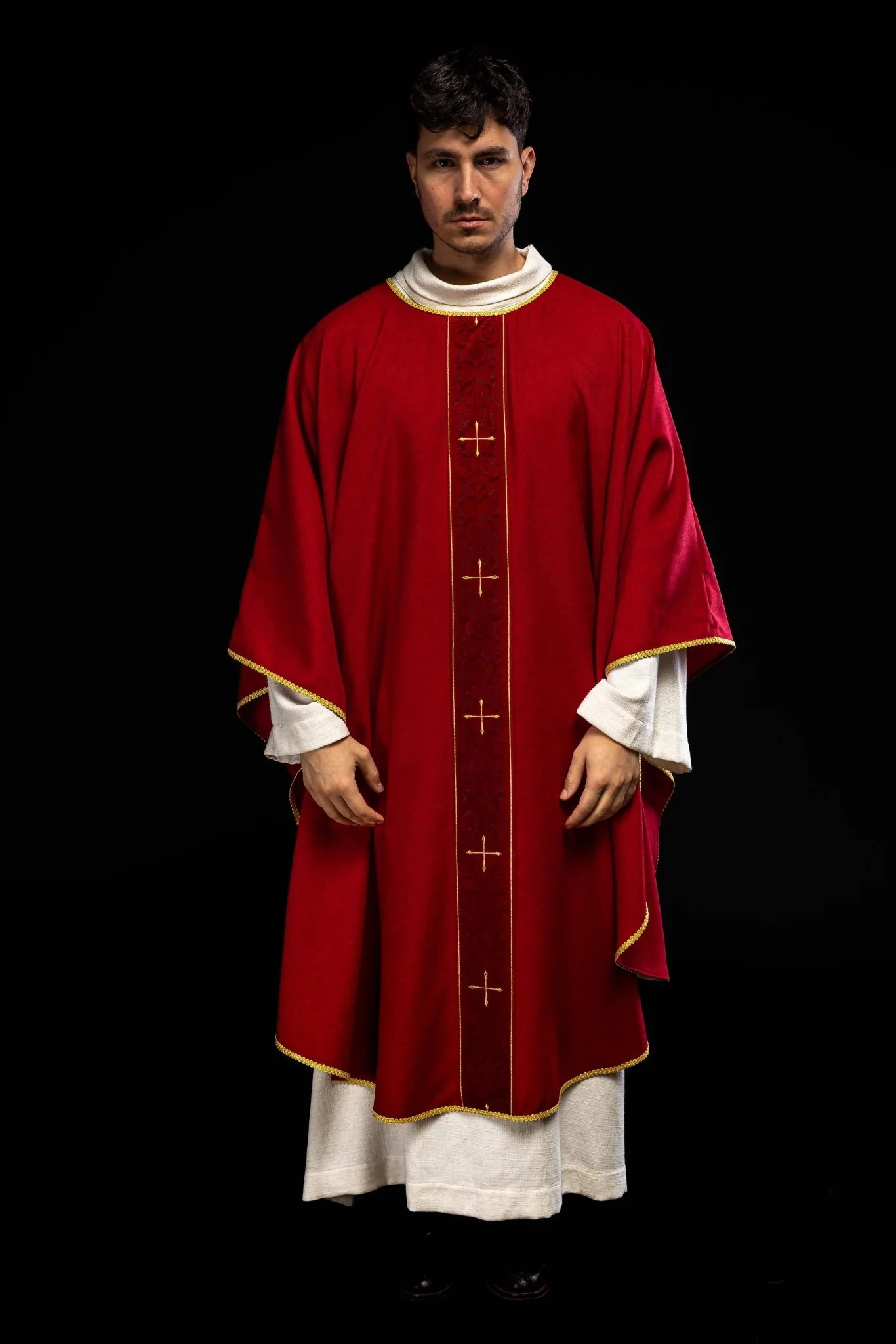 Red chasuble with an embroidered band of crosses
