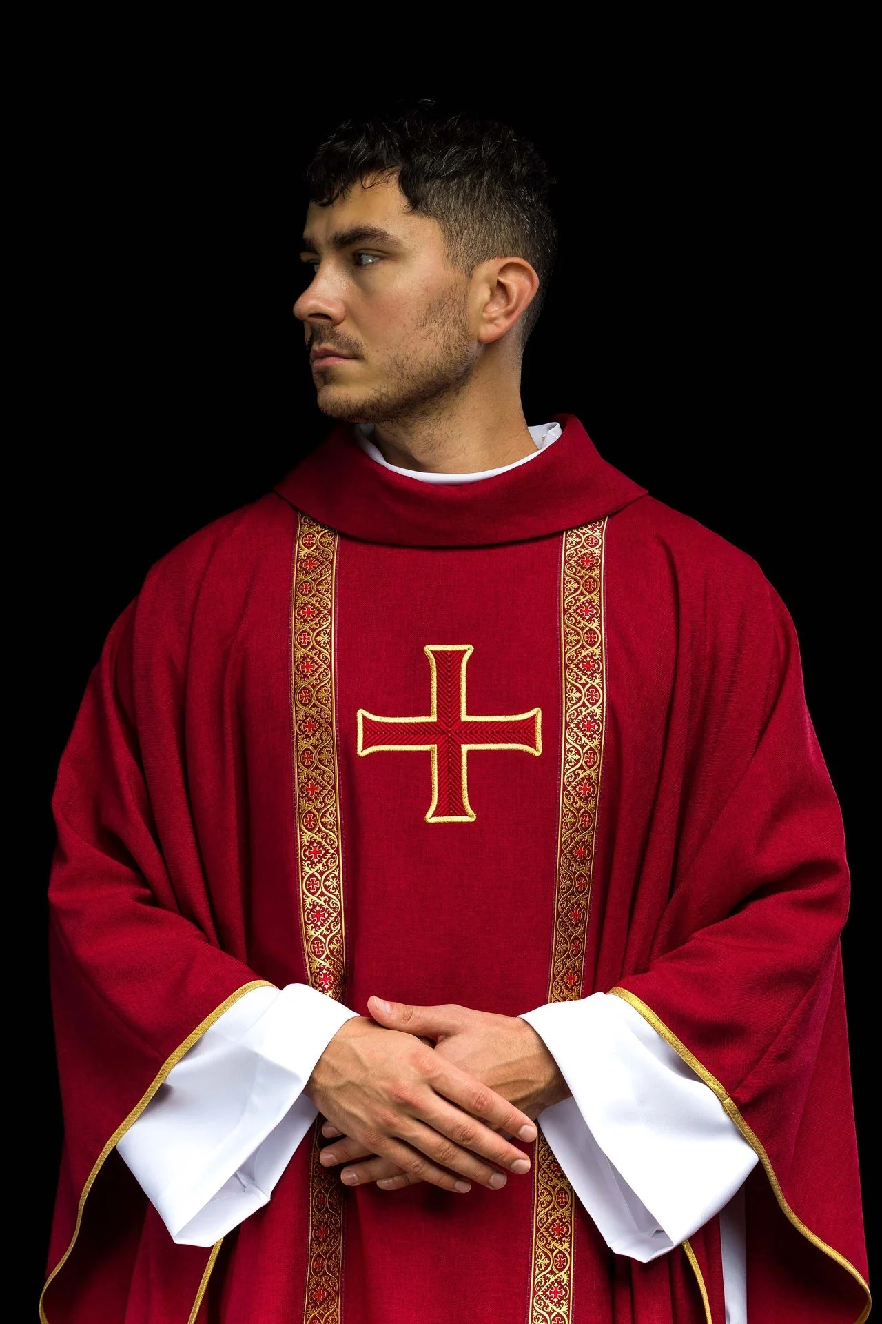 Red liturgical chasuble with embroidered cross and jacquard bands